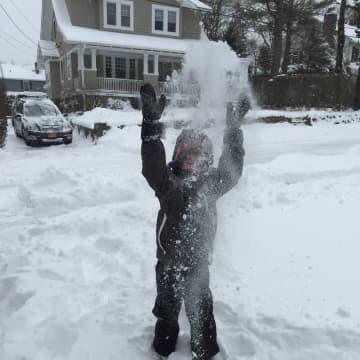 Six-year-old John Olson enjoys the snow.