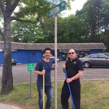 Mike Risko and John Giralomo of the Ossining Chamber of Commerce, sweeping Croton Avenue in a team effort to kick off the Uptown initiative.