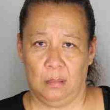 Former New Rochelle city employee Donna Lee was charged with third-degree grand larceny.