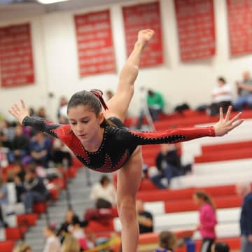 Wilton gymnast Jessica Olin competing at the Level 6 state championships last weekend in Southbury. 