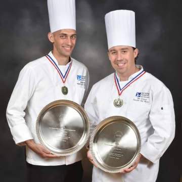 Jason Nyman, Manager of Food & Nutrition of Patient Services (left), and John Graziano, Manager, Executive Chef, (right) with Silver Plate awards for their winning dish at the 2016 Association for Healthcare Foodservice Culinary Competition.