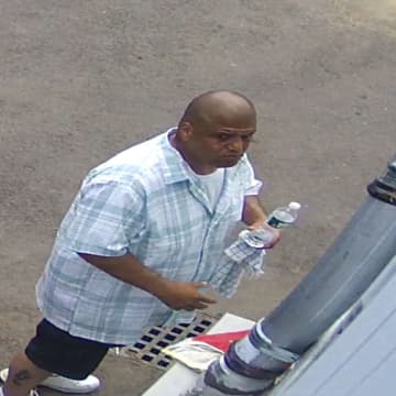 Norwalk Police are searching for the man pictured in connection with a stolen vehicle.