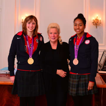 Sacred Heart Greenwich Head of School Pamela Juan Hayes, with Olympic swimmers Katie Ledecky and Lia Neal, who both attended Sacred Heart schools.