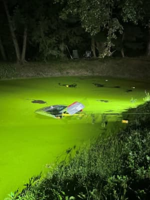 Hudson Valley Woman Rescued By Police After Driving Into Pond, Issued 50 Tickets, Cops Say