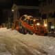 Workers clear snow from the City of Poughkeepsie.