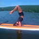 Andrea Powers of Bergenfield did her first headstand on a paddle board.