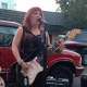 Mary O'Neill, of River Vale, performs outside of Rony's Rockin' Grill, in Bergenfield, with Lunatic Fringe.