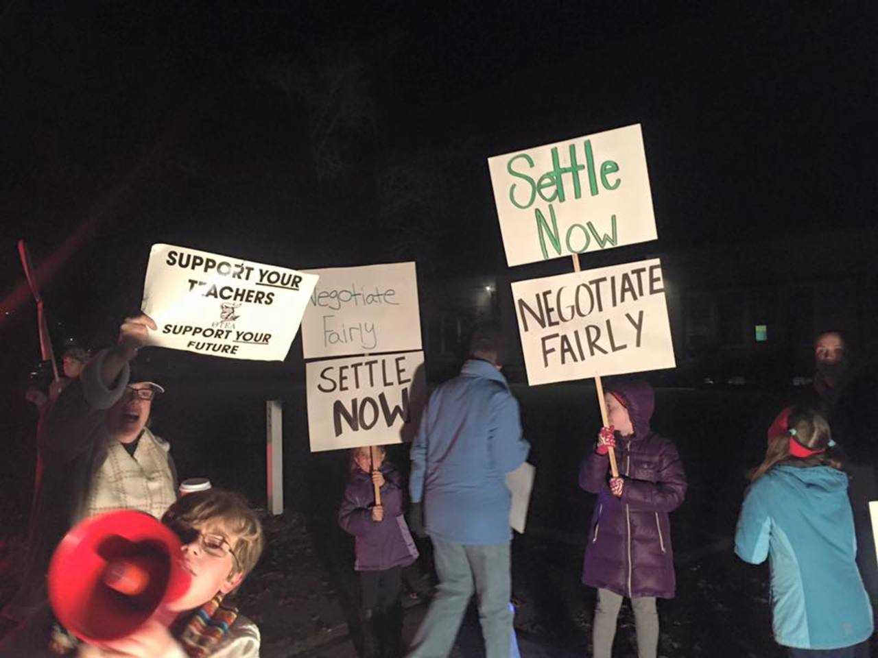OTEA rallies outside of the mediation session on Tuesday.
