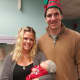 Jackson Walsh with his mother Tara and Eli Manning.