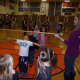 Students play limbo as part of Catholic School Week at St. Leo's in Elmwood Park.
