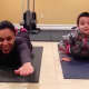 Xiomara Gallego Bernard and her son, Marquez, work out together.