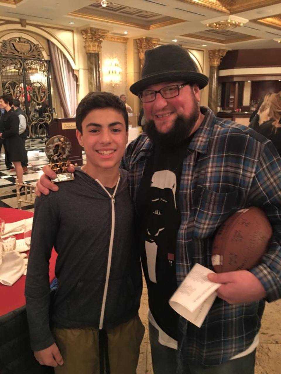 Elmwood Park Bombers players, coaches and family celebrate the season Jan. 27.
