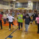 Elmwood Park students at St. Leo's dance in the dance-a-thon for Catholic Schools Week.