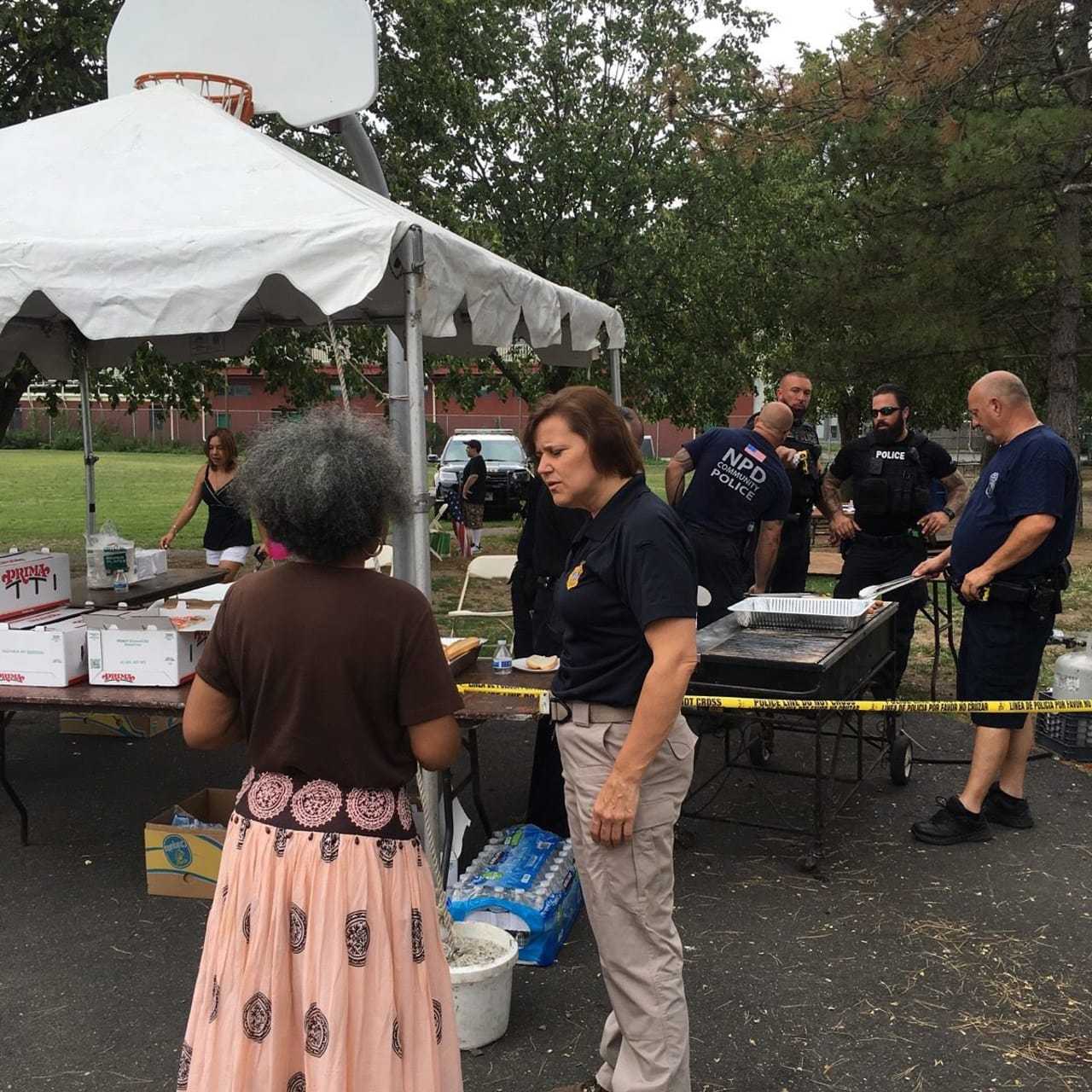Deputy Chief Susan Zecca speaking with a community member.