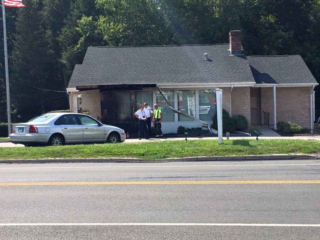 The fire was limited to the exterior of the building at 601 Main St. in Monroe.