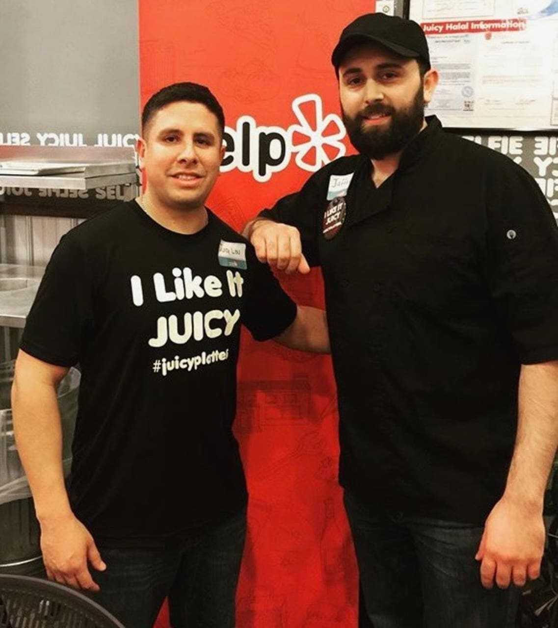 Juicy Platters' outreach official and Fair Lawn police officer Louie Vazquez with Wahdat, who together have donated countless meals to Bergen County residents in need.