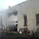 Firefighters tackle a blaze in a commercial building on Paul Street in Bethel.