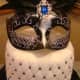 A masquerade-themed cake.