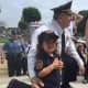 Englewood Cliffs Police Chief Michael Cioffi with Alexandra, 6. "She's a little overwhelmed," mom Christina Theodorakos said. "It's a big crowd and event but she's excited."