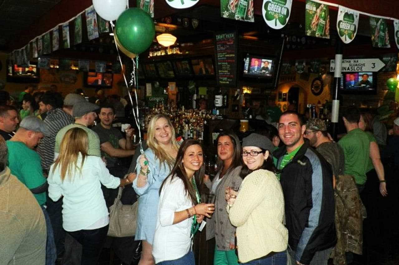 An array of patrons celebrate St. Patrick's Day with Thatcher McGhee's Irish Pub in 2013.