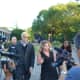 Christopher Schraufnagel and his attorney, Stacey Richman, are surrounded by a media scrum as they leave New Castle Justice Court in downtown Chappaqua.
