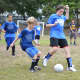 Athletes scrimmage against each other during today's Saddle Brook Angels season opener.
