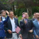 Hillary Clinton waves as she marches in New Castle's Memorial Day parade, which went through downtown Chappaqua. Pictured with her, left to right, are Gov. Andrew Cuomo, state Assemblyman David Buchwald and New Castle Councilman Jeremy Saland.