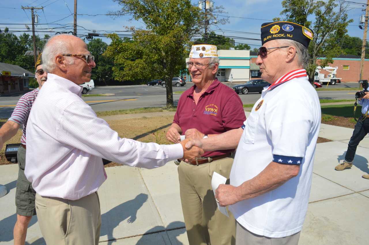 Bottle King owner Kenneth Friedman (left) donated $500 each to the Thomas D. Egan Glen Rock Post 850 VFW and American Legion Post 145