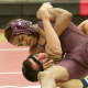Ossining's Clayton Francees (top) controls Alex Rabinowitz of Mahopac in a 120-pound bout.