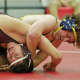 Mahopac's Tom Mahoney gets the best of Derek Gonzales of Ossining in a 152-lb. match.