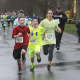 Runners aren't afraid to get wet at the Sandy Hook 5K in Newtown on Saturday.