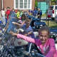 Kids get a chance to sit on police motorcycles at Sunday's Open House. 