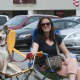 A woman and her dog get front row seats for the Bethel Memorial Day Parade.