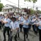 Musical groups step off in the Memorial Day Parade in Bethel on Sunday.