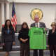 Fair Lawn officials and Mayor John Cosgrove present the Stigma Free T-shirt.