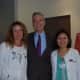White Plains Mayor Tom Roach with WPH holistic nurses Nancy Perseley and Toyoko Yasui