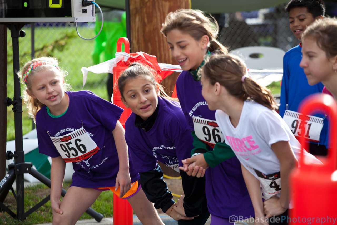 Young runners take that marks at New Milford Education Foundation's 2014 race.