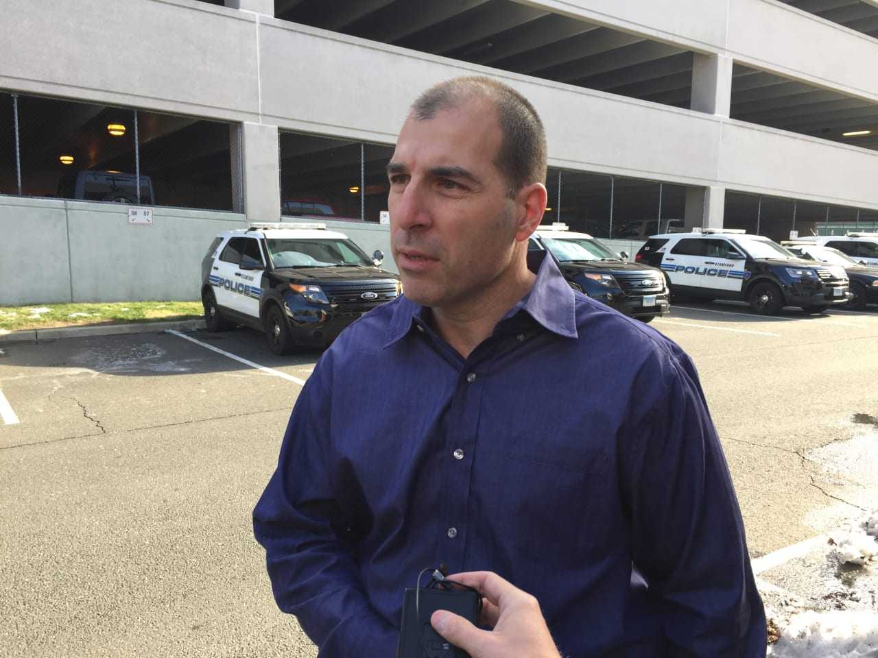 Lt. Tom Barcello speaking with the media after murder suspect Elmer Gomez Ruano is brought into Stamford Police headquarters at noon Thursday.