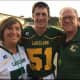 Kevin Moore, with parents Kerri and Patrick.