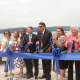 Officials cut the ribbon at Harbor Square in Ossining.