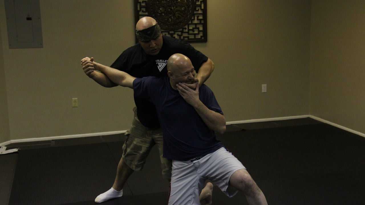 Velella (right) and Medora (left) practice takedown moves.
