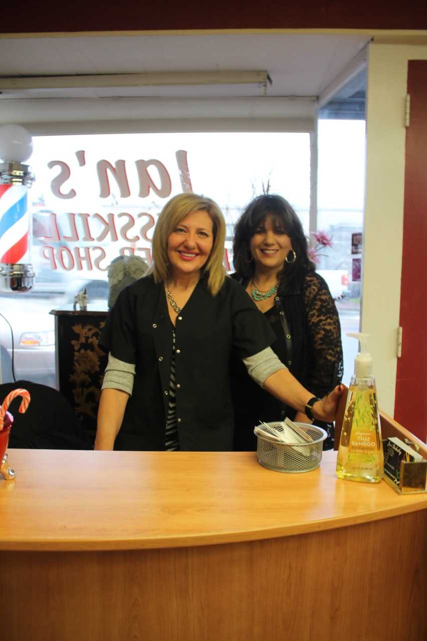 Janice DiGiacomo, owner of Jan's Cresskill Barber Shop, and her hairdresser Victoria Pochini. 