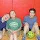 Sports Buddies Jimmy, Kameron and Ellie relax between activities.
