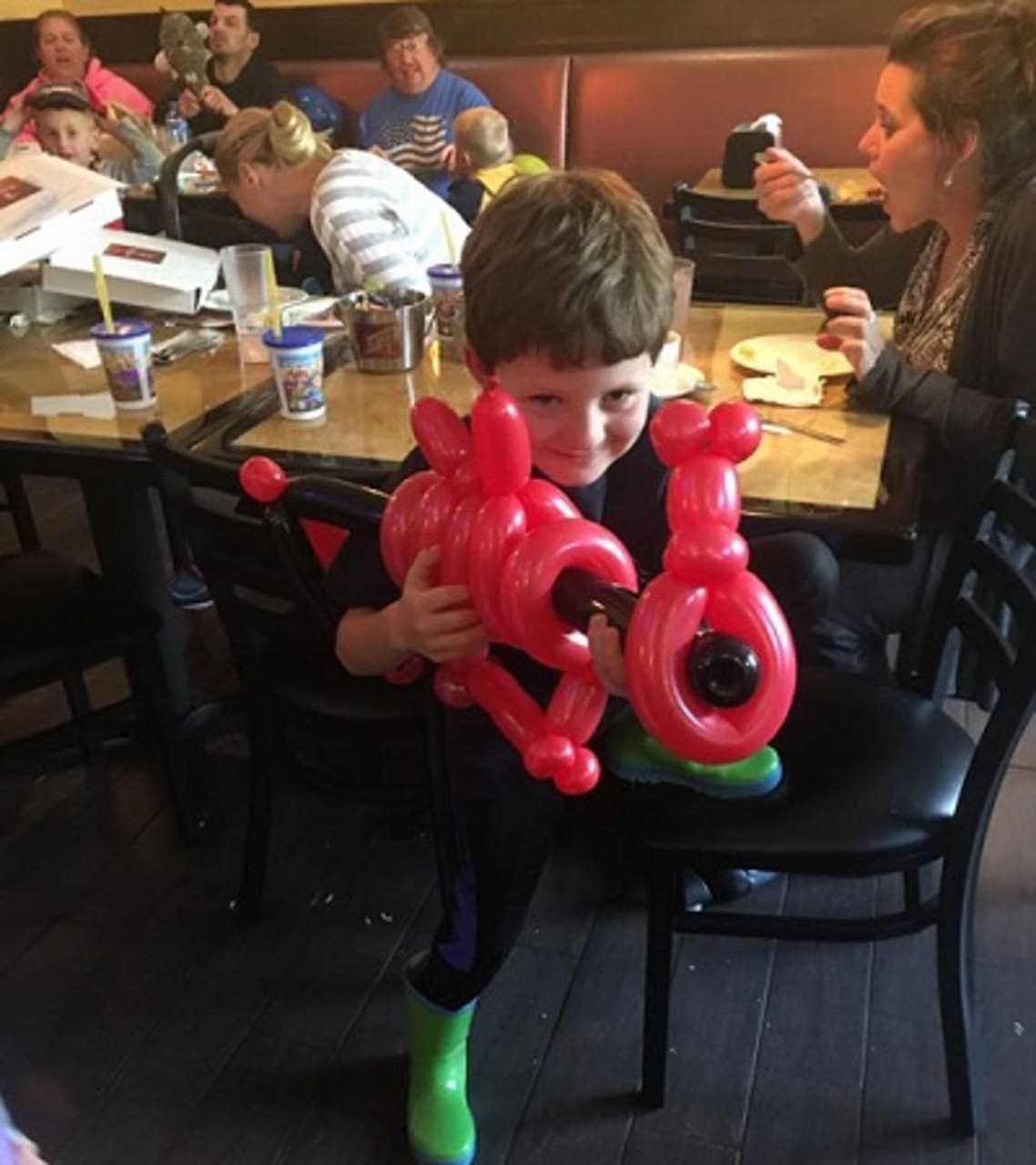 Balloon animals are part of the fun at children's parties at Pizza One in Haskell