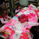 Volunteers of East Rutherford Library's Random Acts of Kindness Club make Valentines.