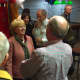 Lynne Vanderslice speaks with happy Republican supporters after her victory in the First Selectman's race.