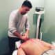 DeCicco of DeCicco Acupuncture in Glen Rock practices "scraping" on a patient.