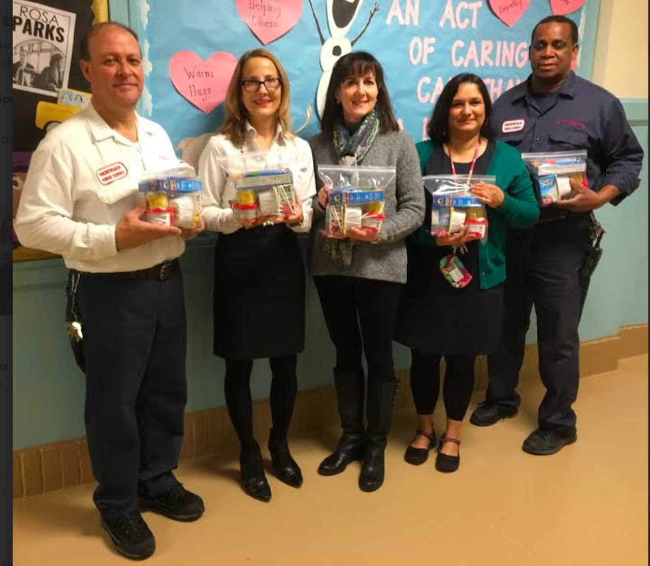 From left, Irwin Vogelman, Frank Pitasi, Jennifer Johnson, Lori Oliff, Marcela Momcloa and Leroy Montgomery