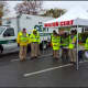 Wilton Community Emergency Response Team members gather to assist at the Go Green 5K road race.