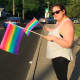 Erin Rogalin, of Shelton, is one of hundreds who attended an Interfaith Vigil in Norwalk on Thursday in memory of the 49 people murdered at a gay nightclub in Orlando.